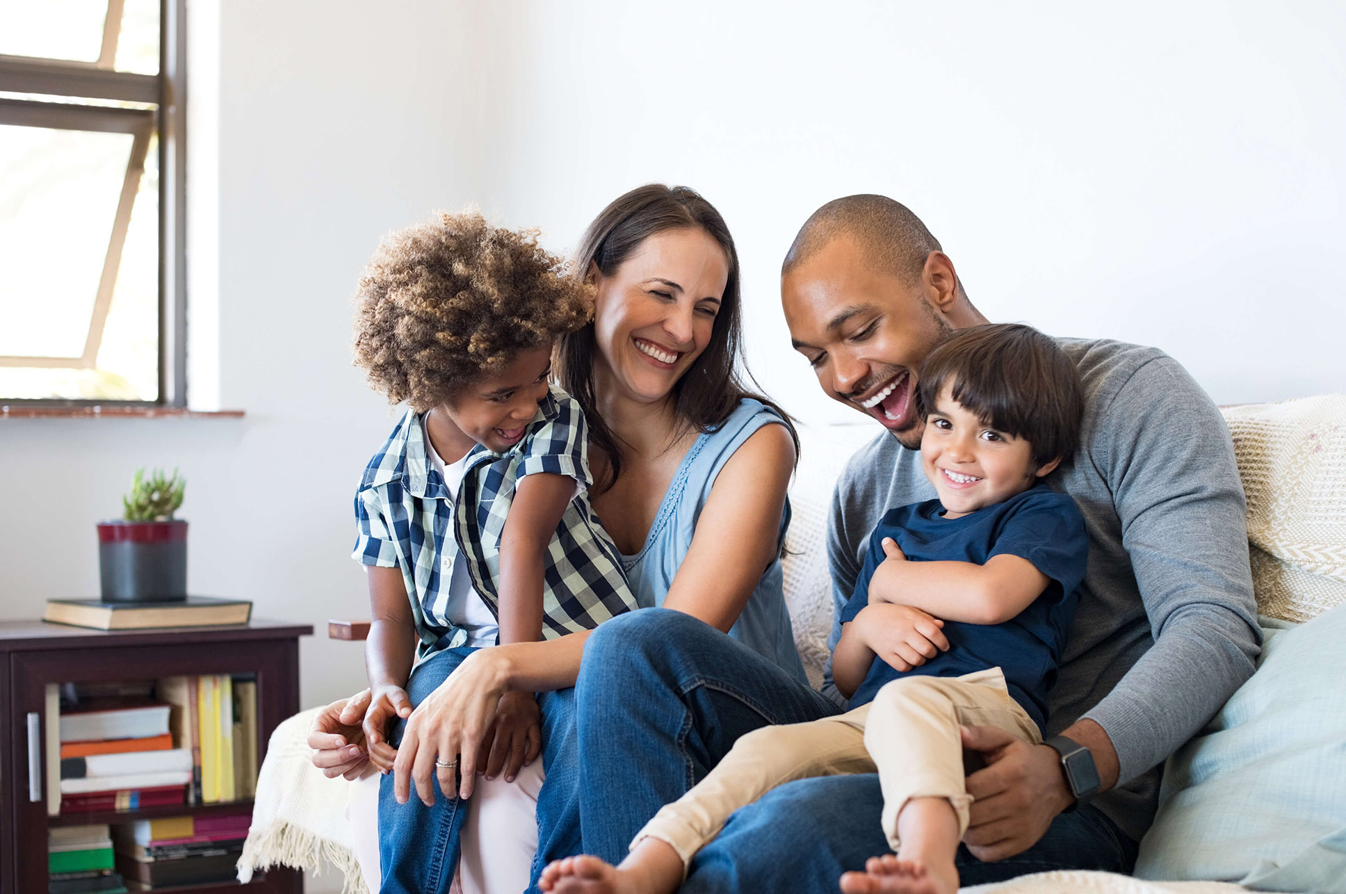 A pregnant mother holding a piggybank